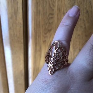 Rose gold color scroll ring